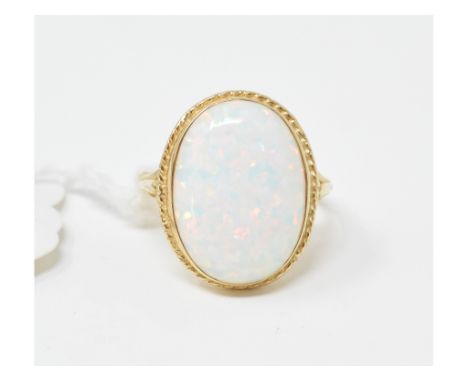 A 9ct gold and Gilson opal set ring, approx. ring size M½