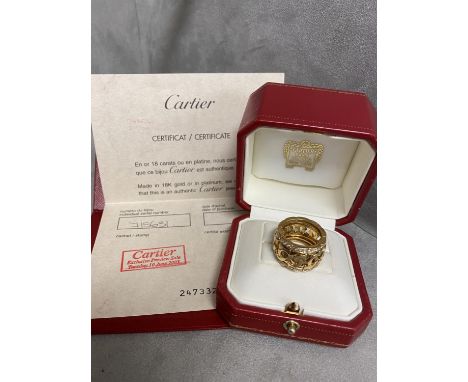 CARTIER an 18k gold  platinum and diamond full eternity ring of pierced design with two lines of single cut diamonds box and 