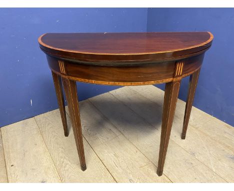 Mahogany and inlaid demi lune fold over card table 