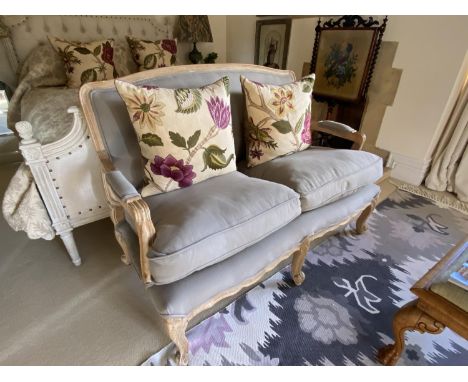 Contemporary wooden framed two seater sofa, upholstered in a grey fabric, on raised cabriole style legs 