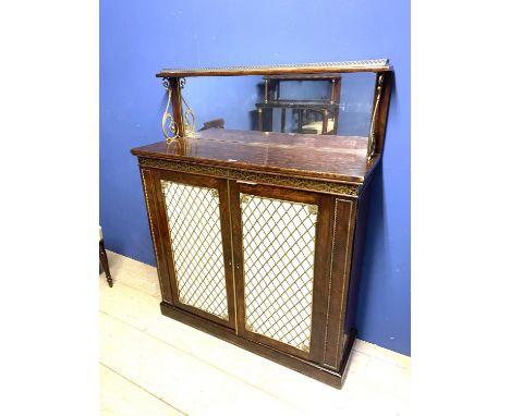Good Regency brass inlaid rosewood chiffonier with mirrored back below brass galleried shelf above a pair of brass grille doo