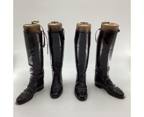 Two pairs of black ladies leather hunting boots by Rowell and Sons, Melton Mowbray both with wooden trees 