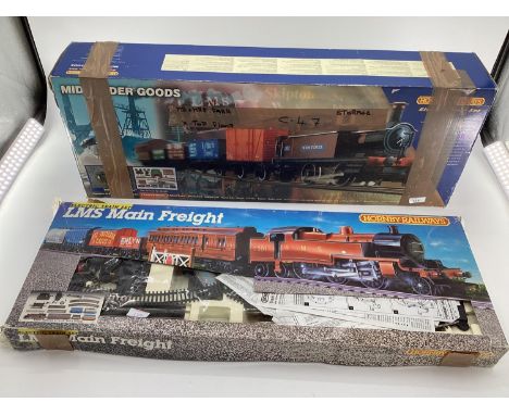 Two boxed trains, LMS Main Freight, and Hornby Railways Midlander Goods, see images 