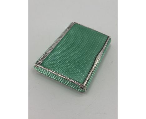 A sterling silver and engine turned enamel pocket snuff box, stamped 925 with import marks, maker A J 1930, 122g  (2 small ar