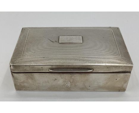 A sterling silver cedar lined cigarette box with engine turned decoration by A J Zimmerman, Birmingham 1928, 373 g gross 