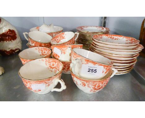 A 38 PIECE LATE VICTORIAN PORCELAIN TEA SERVICE, TRANSFER PRINTED IN BRICK RED (38) 