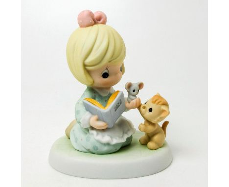 Number 811807. Porcelain figure of a young girl holding Holy Bible, accompanied by mouse and a cat.Precious Moments by Enesco