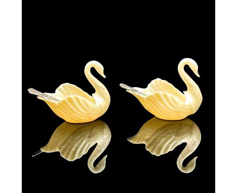 Two cream colored porcelain open backed swans each with sterling silver spoon. Lenox backstamp. Issued: 20th c.Dimensions: 2.