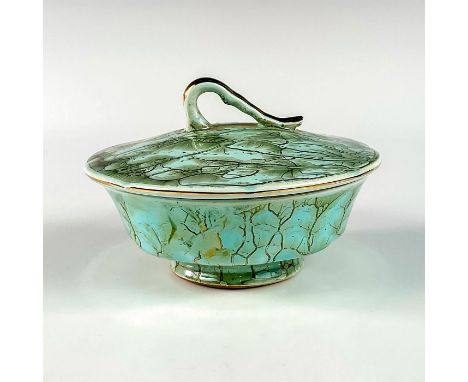 Turquoise with lustre finish and branch patterning. Gold toned lines on candle area.Hand Painted Delft Holland on bottom. Thi