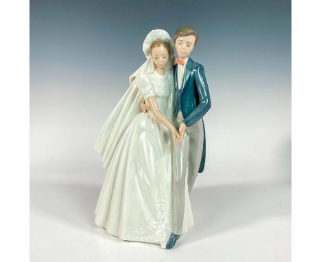 Model number 2001247; a beautiful group figure of a bride and groom dancing. Nao backstamp. This item has its original box: 1