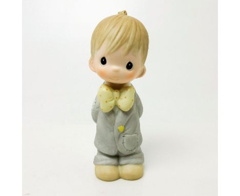 Part of Bridal Party series. Features little boy dressed in jacket, pants, and bow tie.Includes original Precious Moments box