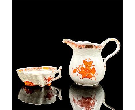 White porcelain creamer pitcher and sugar bowl in a rust color floral and leaf design; gold rim. Herend backstamp. The creame