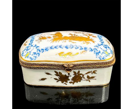 White porcelain hand-painted hinged box with fishing scene in gold with blue floral and leaf accents. Signed Lewa. Dimensions