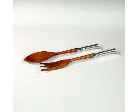 A contemporary fork and spoon set with sterling silver handles and carved wooden spoon bowl and fork. Hallmarked Sterling 42.