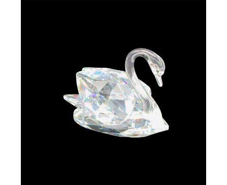 Clear, faceted body with smooth neck and face. Swarovski backstamp. 7633 050 000. This item has its original box: 3.25"L x 3.