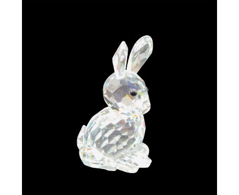 Clear body with distinctive cuts on ears, tail and feet. Black button eyes. Swarovski backstamp. 7623 055 000. This item has 