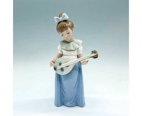 A glazed figure of a girl playing a string instrument. Nao backstamp. Artist: Francisco CatalaIssued: 1992Dimensions: 3.75"L 