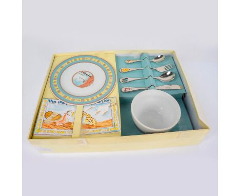 Porcelain storyteller set including, a bowl, a plate, a knife, fork, a soup soup, a dessert spoon, and a book. Couzon backsta