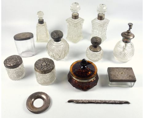 Eleven silver topped bottles and jars, ring tidy and comb mount, 110grs of weighable (some faults) (13)