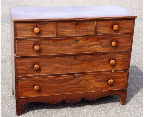 Regency mahogany chest with a reeded top, 3 short and 3 graduated long drawers below, with a scroll apron, on bracket feet, 1