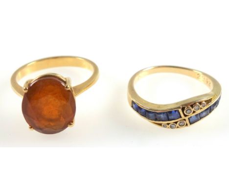 Yellow metal ring set 10 sapphires and 6 diamonds, stamped “585”, 2.5grs, and a yellow metal ring set carnelian, gross 3.6grs