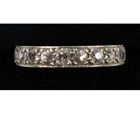 White metal eternity ring, size O 1/2, set 22 diamonds (1ct approx.), gross 3.4grs