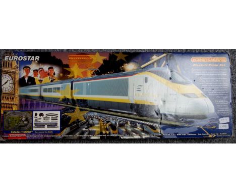 Lot consisting of Hornby Eurostar set R.1013, Track Pack C R8017, Hornby Triang LMS Steam Engine No 7606, Hammant &amp; Morga