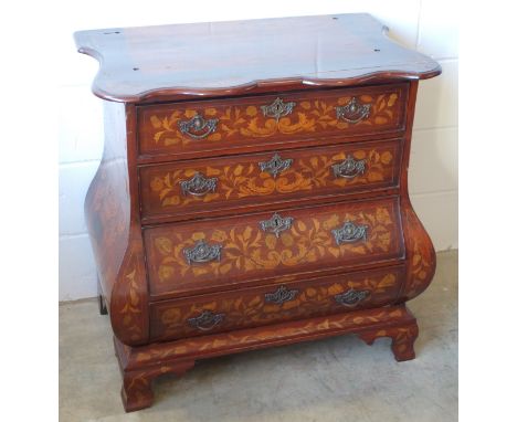 Early 19th century Dutch walnut bombe chest with all-over inlaid floral marquetry decoration and 4 drawers, on bracket feet, 