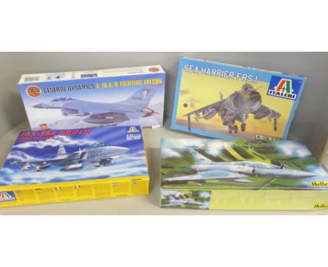 Four model kits, Sea Harrier, Fighting Falcon and two others 