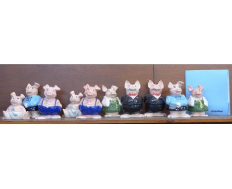 Ten Wade Nat West piggy banks (two sets of five) and a booklet with cheque book cover 