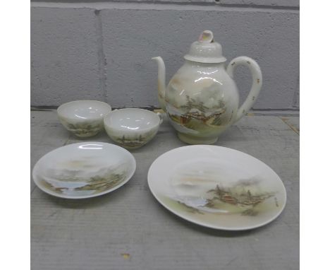 A Japanese tea and dinner service **PLEASE NOTE THIS LOT IS NOT ELIGIBLE FOR POSTING AND PACKING** 