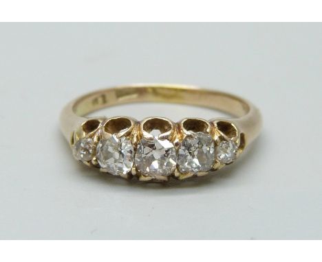 An antique 18ct gold, five stone diamond ring, approximately 0.80ct diamond weight, 3.4g, P/Q 