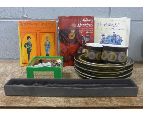 A box of plates, Dumbledore wand, three German uniform books, Bakelite reel and scale **PLEASE NOTE THIS LOT IS NOT ELIGIBLE 