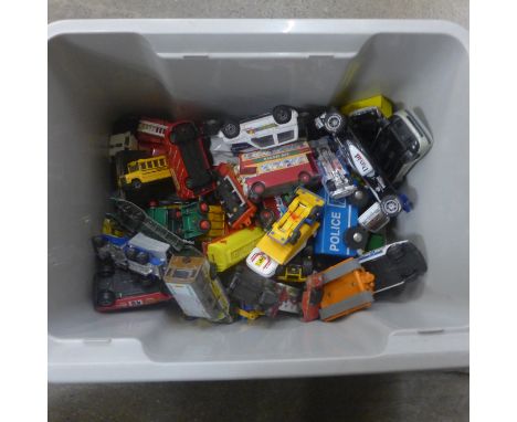 A box of die-cast model vehicles 