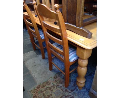 LIGHT WOOD TABLE AND FOUR LADDER BACK CHAIRS. L182CM