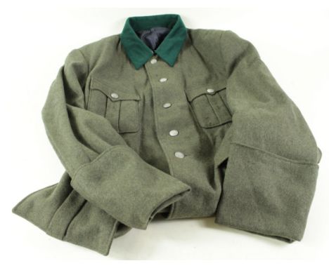 German Army Officers Tunic, stripped of Insignia, privately tailored, some buttons maker marked and dated 'K &amp; Q 1939'. Z