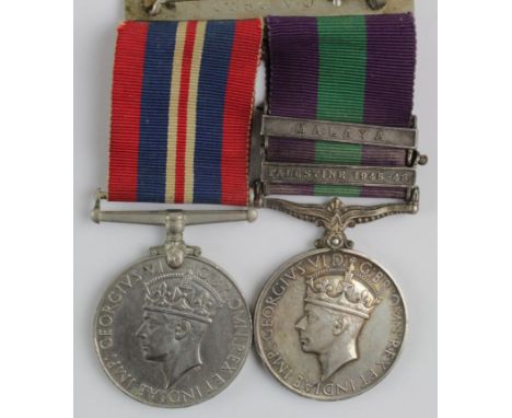 GSM GVI with bars Palestine 1945-48 and Malaya (last clasp loose), and War Medal to 14442626 Bdr K May RA.   Mounted as worn 