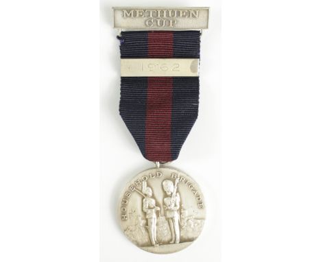 Household Brigade unmarked silver medal for The Methuen Cup for 1962. Both bars are silver plated. Whole item weighs 34.1gms.