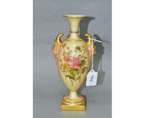 A ROYAL WORCESTER BLUSH IVORY TWIN HANDLED VASE, with mask handles, printed and tinted with floral sprays, on a short pedesta