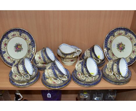 A BOXED ROYAL WORCESTER FORTY PIECE TEA SET, transfer printed blue and gilt ground with printed and tinted floral sprays, pat