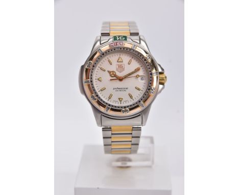 A TAG HEUER 4000 SERIES QUARTZ WRISTWATCH, silvered dial, gold coloured baton and arrow markers, date window at 3 o'clock, tw
