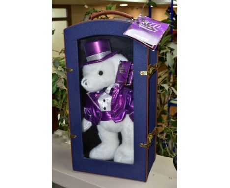 A CASED MILLENNIUM KEEPSAKE BEAR, sparkly white plush bear which appears complete and in very good condition, looks to have h