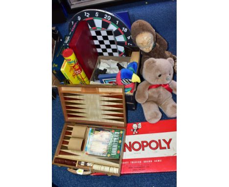 A BOX AND LOOSE OF TOYS AND GAMES, including a wooden cased backgammon set, a boxed Monopoly, darts board and darts, Merit Ju