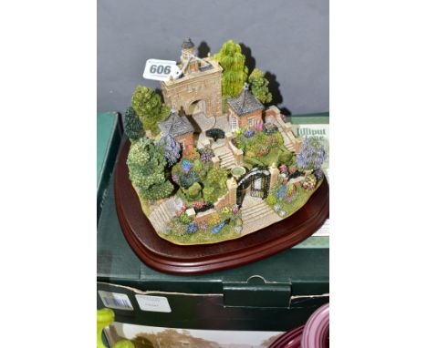 A BOXED LIMITED EDITION LILLIPUT LANE SCULPTURE CELEBRATING THE MILLENNIUM, 'The Millennium Gate' L2170, No.184/2000, on a wo