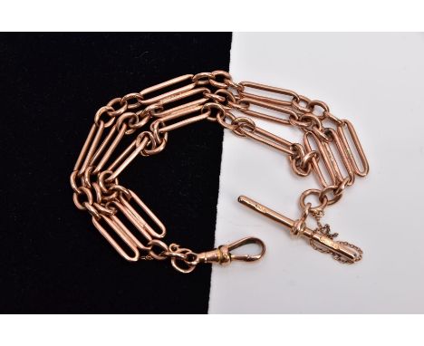 A 9CT GOLD BRACELET, designed with three fetter style chains, fitted with a T-bar and a lobster claw clasp, hallmarked 9ct go