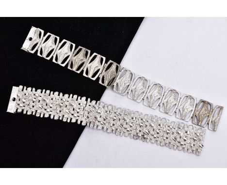TWO SILVER WIDE BRACELETS, the first of an openwork abstract design, fitted with a double locking clasp, hallmarked 'D Shackm