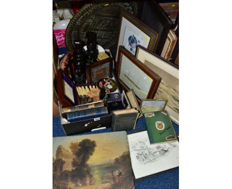 A BOX OF BOOKS, CASED FISH EATERS, CARVED TRIBAL BUST CANDLESTICKS, PAINTINGS AND PRINTS, etc, including an Indian embossed b