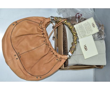 A LADIES LIGHT BROWN LEATHER HANDBAG WITH DECORATIVE HANDLE, together with a boxed pair of ladies pale grey fashion boots, ma