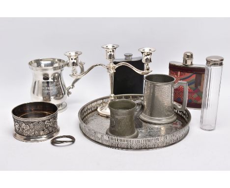 A SELECTION OF WHITE METAL ITEMS, to include a silver plated on copper round tray, with a pierced wreath decorated rim, a thr