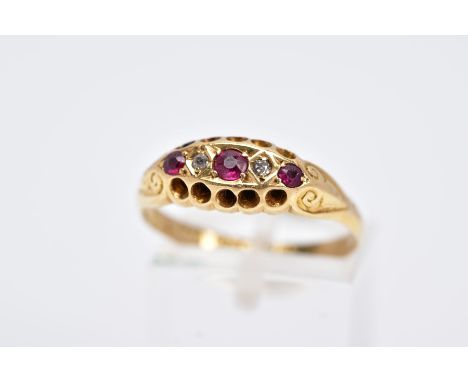 AN EARLY 20TH CENTURY DIAMOND AND RUBY RING, of a boat shape, set with three circular cut rubies, interspaced with two old cu